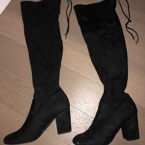 Worn a couple of time over the knee black boots